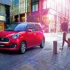 Red Daihatsu In City Streets Diamond Paintings